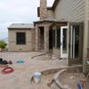 Stone covers the house entrance. Pavers now dictate where we walk and define the planting areas and vistas we will enjoy.