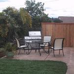 Enclosed and private, this finished bar-b-que area takes advantage of the wind flow to move the grilling smoke away from the house.